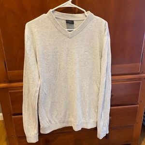 Lightweight grey Oakley sweater.